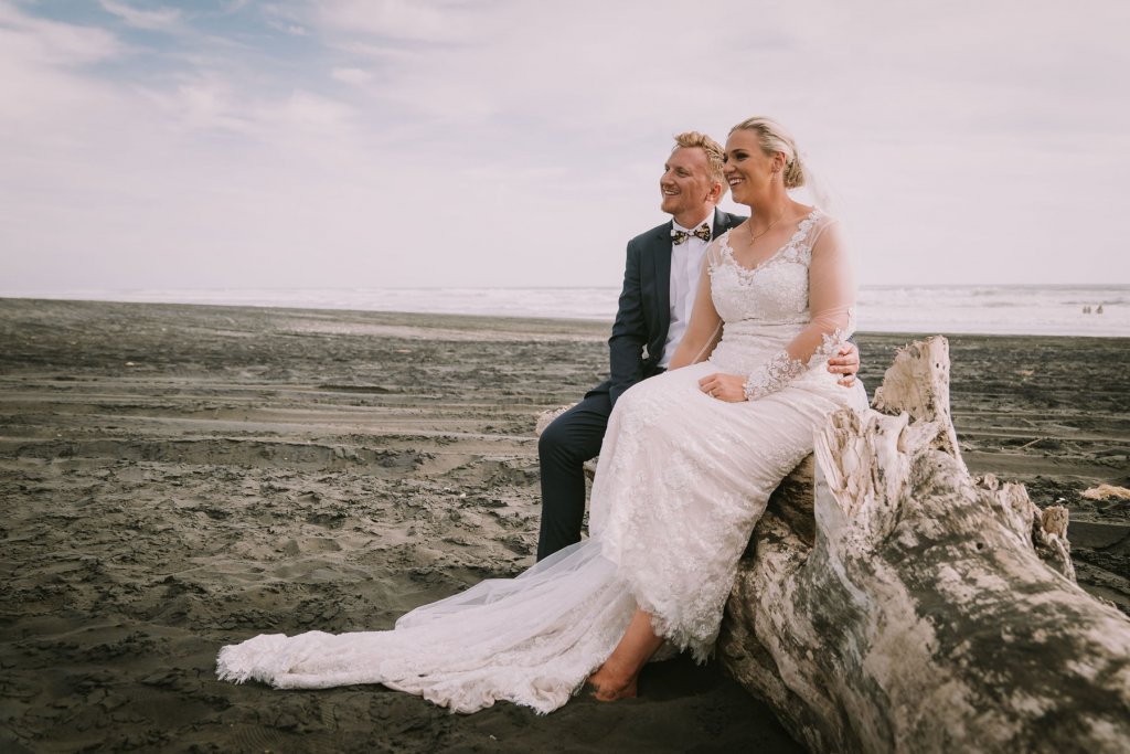 Real Bride Jamielle wearing her Custom Harriett Falvey Wedding Dress and Veil Made in New Zealand